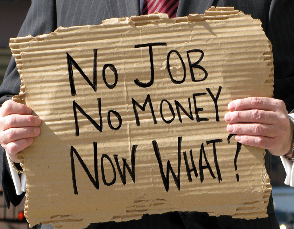 cardboard sign reading, no job, no money, now what?